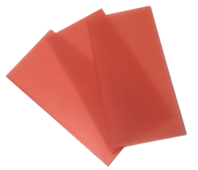 Sheets of medium red dental base-plate all season wax in 3x6 rectangles.
