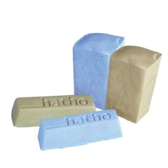 100 gram bar of blue high-shine polishing material, and one 100 gram bar of beige medium polish material.